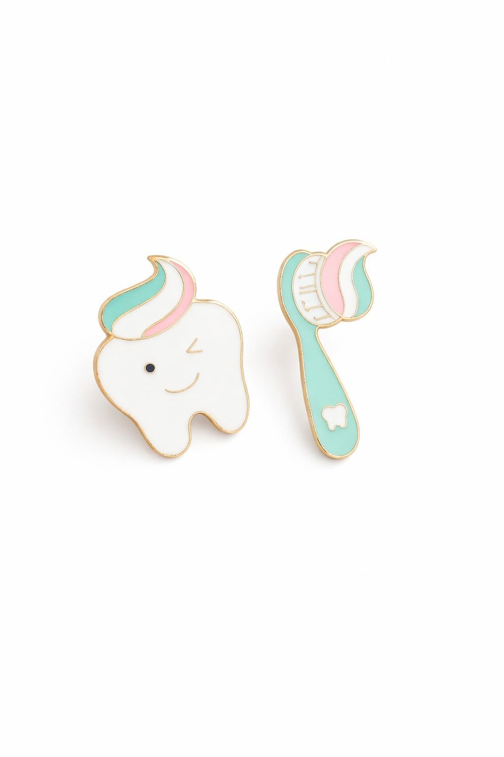 PRENDEDOR – SET DE MUELA + CEPILLO DENTAL